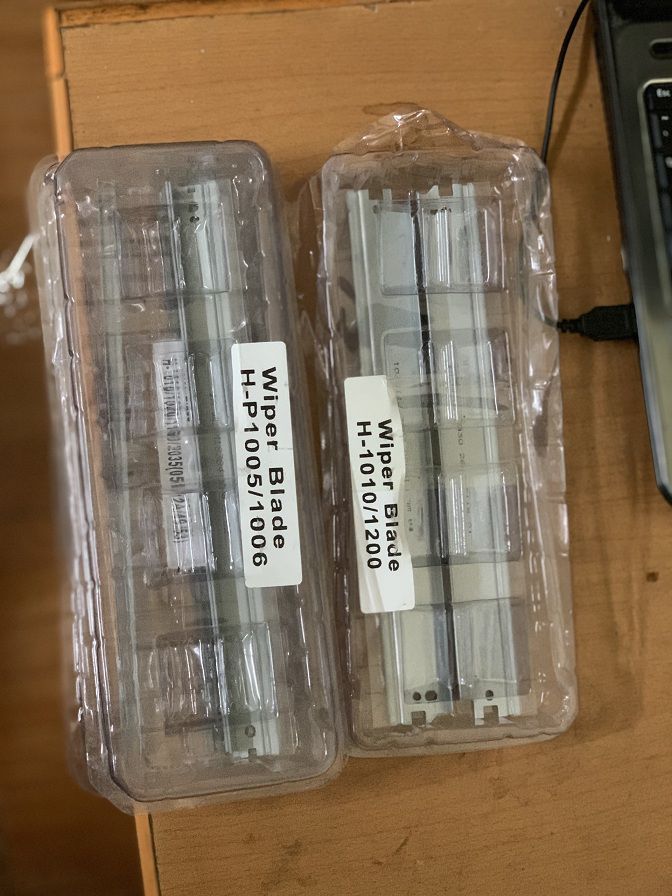 thay gạt mực khi đổ mực máy in